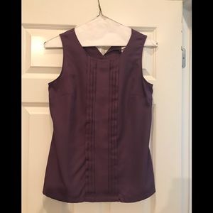 Purple pleated sleeveless blouse. Worn once.
